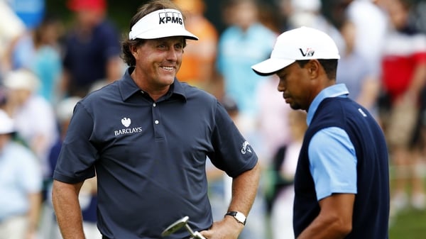 Phil Mickelson had more to smile about than Tiger Woods after the opening round