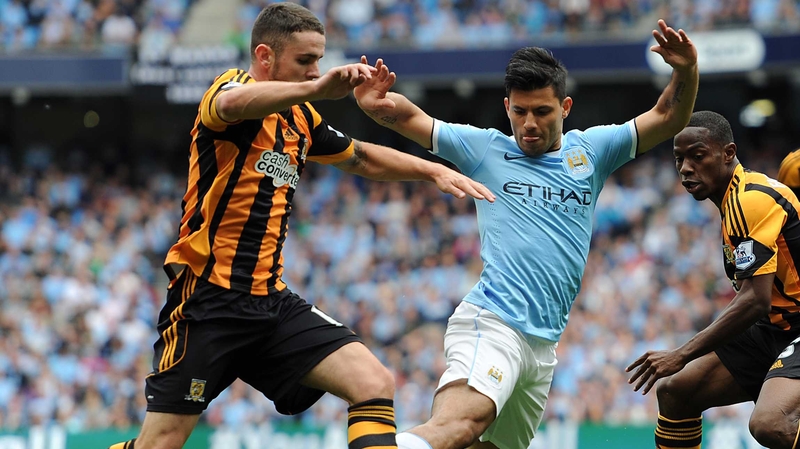 Sergio Aguero of Manchester City clashes with Ireland's Robbie Brady