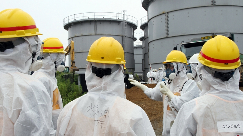 Japan's nuclear inspectors at water tanks early this month where radiation levels have rocketed in 'deplorable' situation