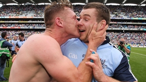 Dublin's Paul Flynn lands a smacker on Kevin McManamon after the game