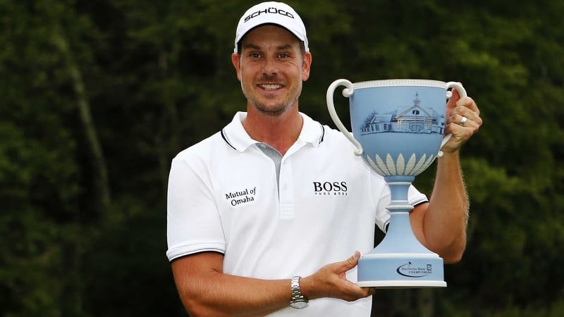 Henrik Stenson wins the winner's trophy after his success in Boston