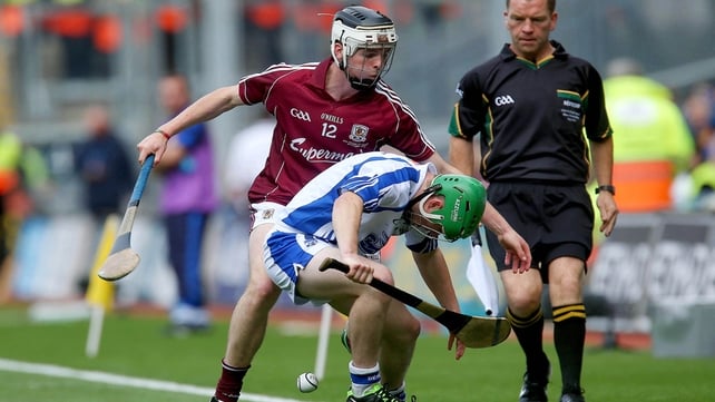 Cian Leamy Waterford and Adrian Morrissey Galway tussle for possession.