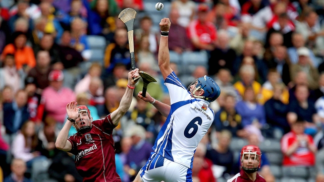 Austin Gleeson of Waterford and Conor Whelan of Galway contest a high ball.
