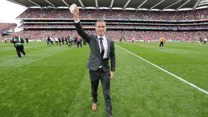Robert Heffernan - World champion in the 50km walk shows off his gold medal before the start of the match