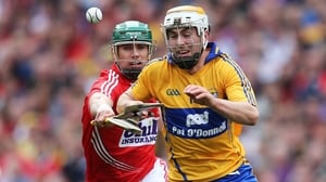Clare's Conor McGrath tries to evade the attention of Brian Murphy