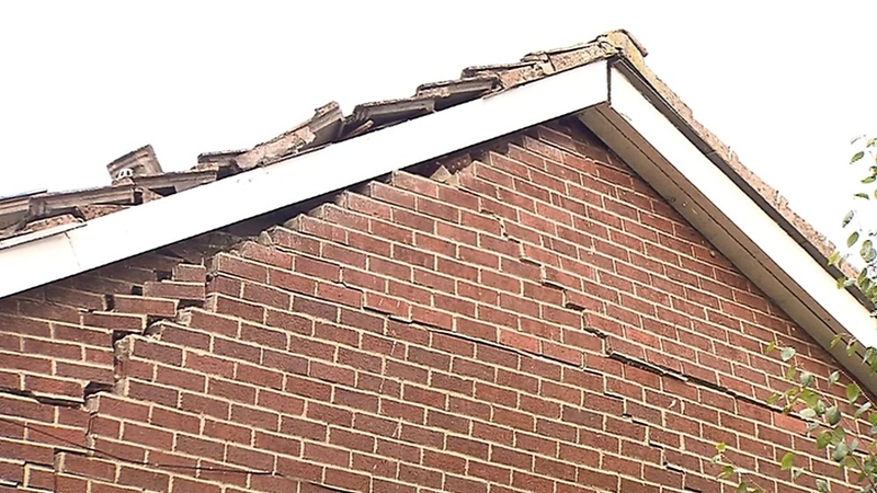 A gable wall of the complex was damaged in the explosion