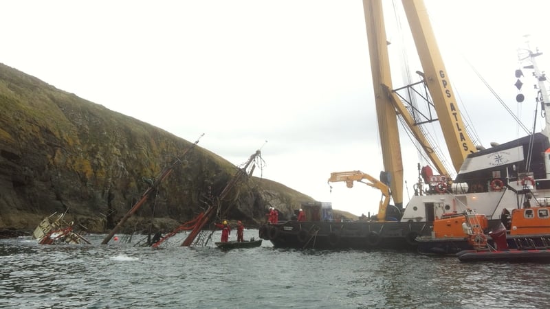 A floating crane is being used to raise the Astrid