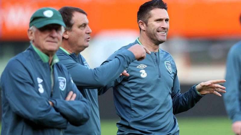 Robbie Keane and the Republic of Ireland management team pictured in relaxed mood at the Ernst Happel Stadium in Vienna on Monday