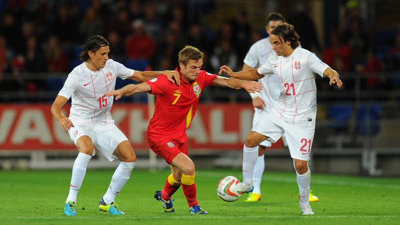 Wales' Andy King is well marshalled here