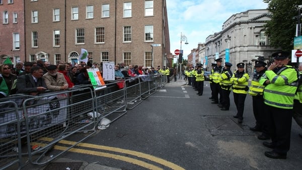 The arrests are part of an investigation into a series of violent incidents outside the Dáil on 18 September