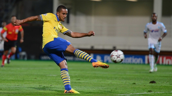 Theo Walcott scoring Arsenal's opener against Marseille at the Stade Velodrome