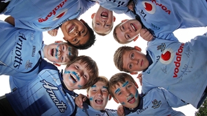 Students from Scoil Mhuire CBS, Griffith Avenue, Marino, show their support for Dublin