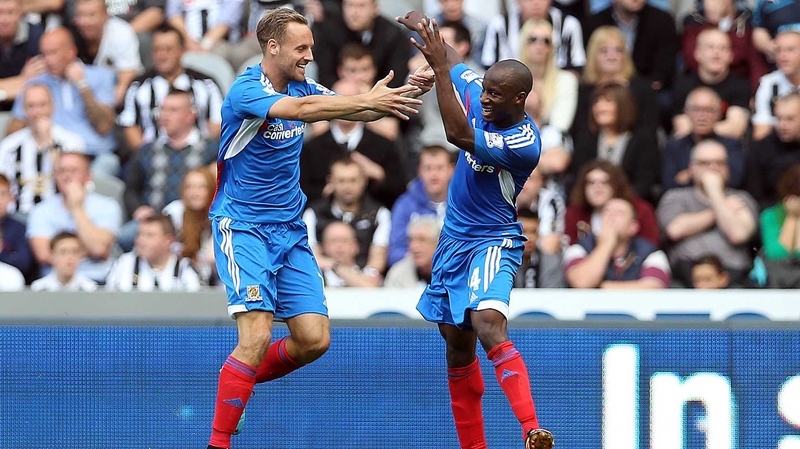 Sone Aluko (r) celebrates his winner for Steve Bruce's side