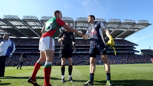 Captains Andy Moran and Stephen Cluxton exchange handshakes before the start of the game