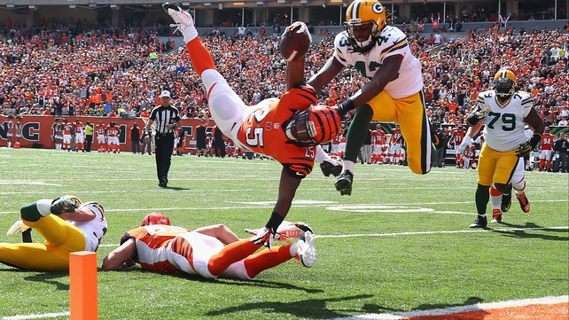 Giovani Bernard of the Cincinnati Bengals scores a touchdown during the NFL game against the Green Bay Packers at Paul Brown Stadium in Cincinnati, Ohio.