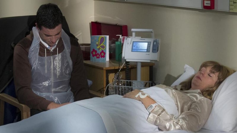 Cathal waits by Bernie's hospital bed