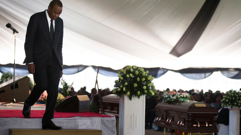 President Uhuru Kenyatta attends the funerals of some of the victims of the attack