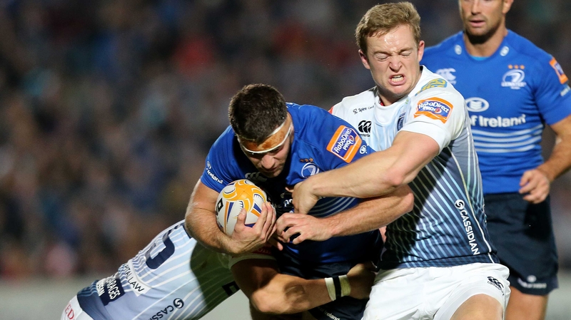 Leigh Halfpenny and Owen Williams tackle Fergus McFadden