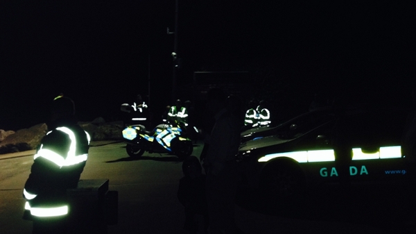 More than a dozen gardaí are still at the scene
