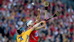 Clare's David McInerney and Luke O'Farrell of Cork
