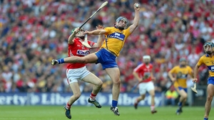 Conor Ryan of Clare with Seamus Harnedy of Cork