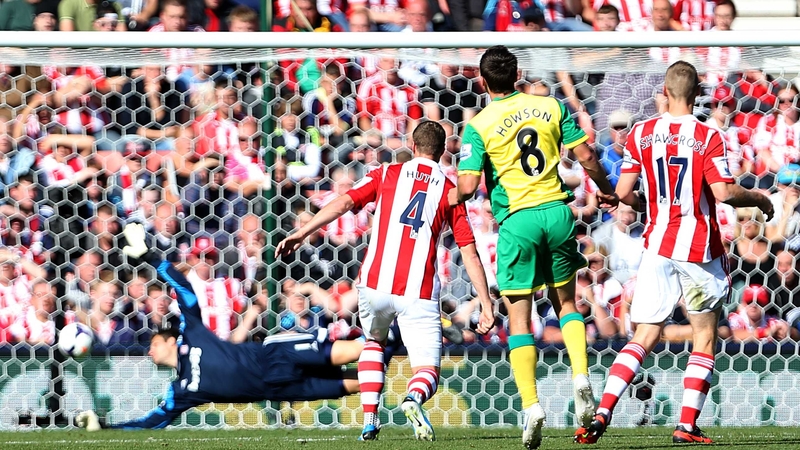 Jonny Howson watches his shot head for the back of the Stoke net