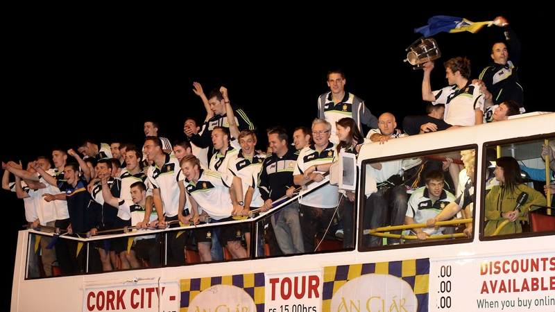 The Clare panel celebrate as their open-top bus arrives at Tim Smythe Park