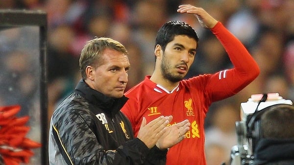 Brendan Rodgers believes that working with Luis Suarez has made him a better manager