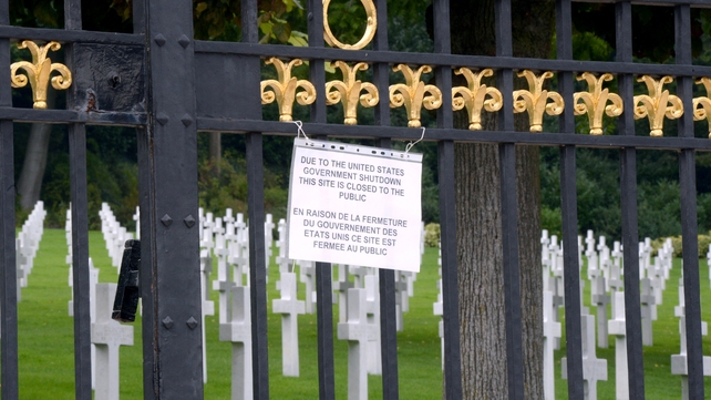 A board informs visitors of the closing of the Suresnes American Cemetery and Memorial in Paris