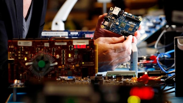 Intel says its third-quarter net income fell to $2.95 billion from $2.97 billion a year earlier