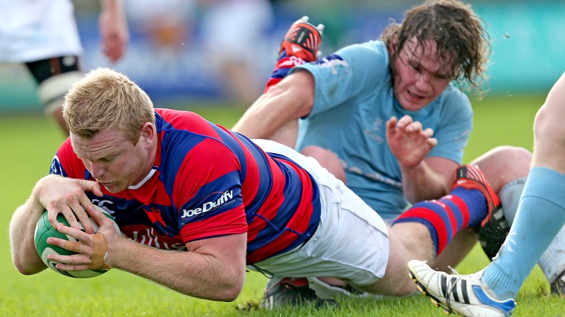 Clontarf's Royce Burke-Flynn scores his side's third try against Garryowen