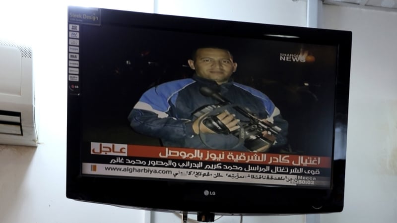An unidentified gunmen shot two Iraqi television journalists dead as they were filming in the northern city of Mosul