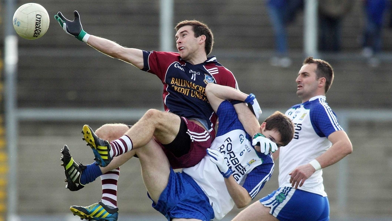 Ballinascreen's Brendan Heron and Ballinderry's Gareth McKinless get in a tangle