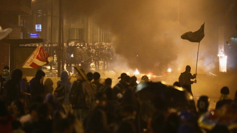 Police fired tear gas and protesters threw stones and Molotov cocktails