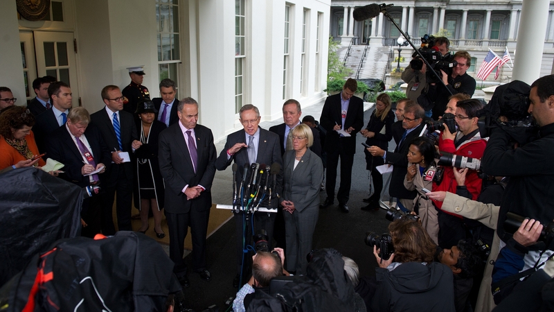 Senate Majority Leader Harry Reid speaks to the press after meeting with US President Barack Obama