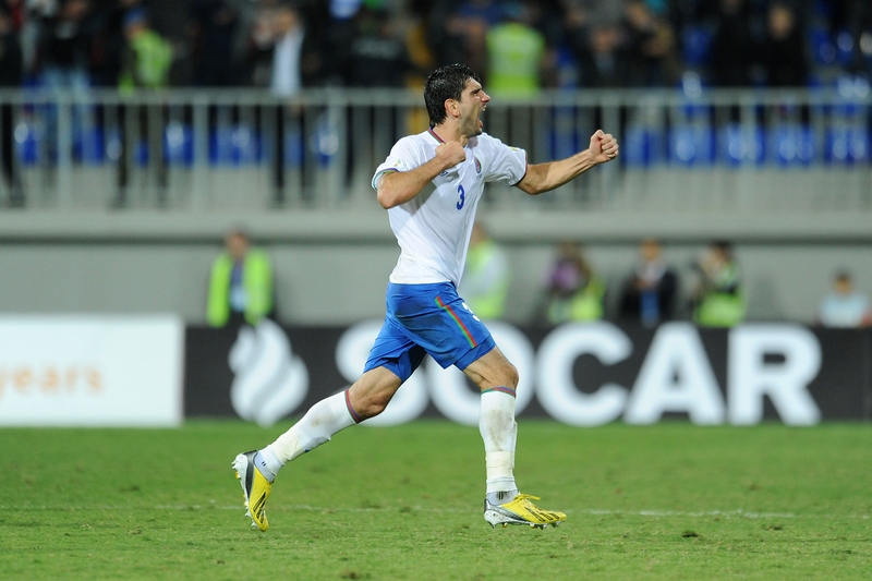 Azerbaijan's Rasim Ramaldanov celebrates at the final whistle