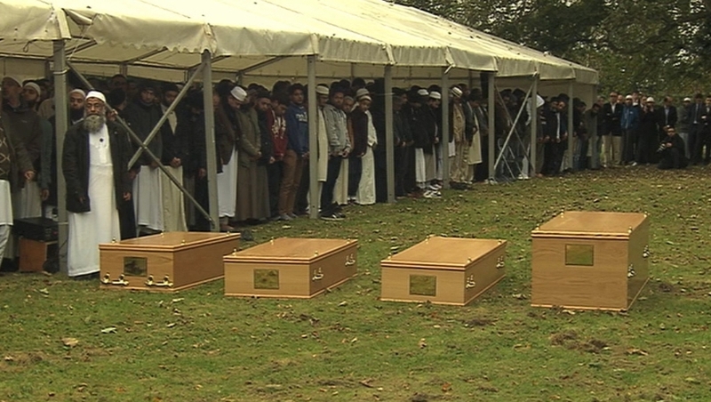 Dr Muhammad Taufiq al-Sattar leads prayers at funerals of four members of his family