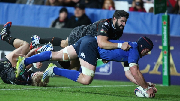 Leinster's Sean O'Brien scores a try despite Osprey's Tito Tebaldi's efforts