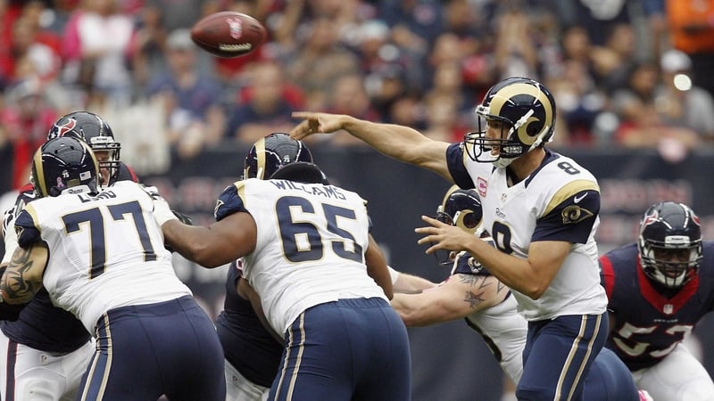 Sam Bradford of the St Louis Rams throws a pass against the Houston Texans at Reliant Stadium