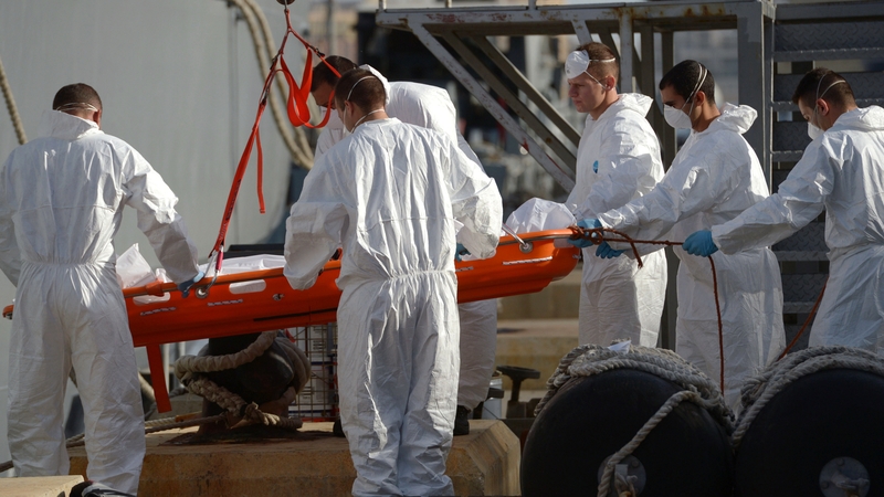 A body is recovered from the sea after last week's drownings in the Mediterranean