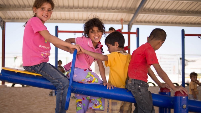 Children in a makeshift playground at the Zaatari camp