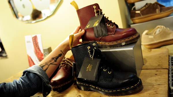 Iconic bootmaker Dr Martens has cut its annual profit outlook
