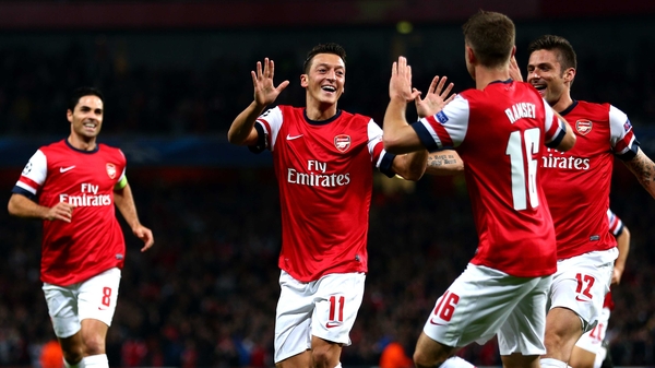 Arsene Wenger: 'We don't put any special responsibility on [Ozil]. Maybe he feels a bit more pressure to do that'