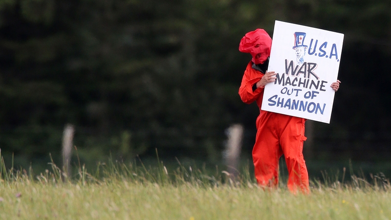Irish law permits military aircraft to land at Shannon provided planes are unarmed