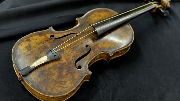 Violin played as Titanic sank fetches record price at auction