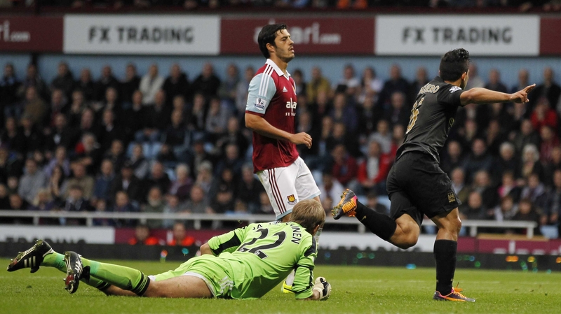 Sergio Aguero turns to celebrate after scoring against the Hammers