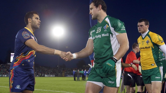 Captains Daniel Wells and Michael Murphy shake hands before the throw-in