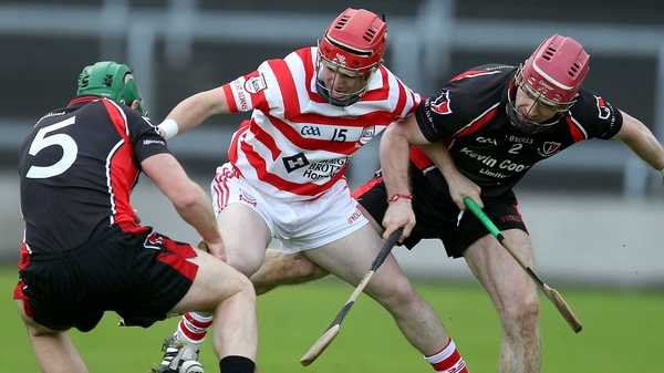 Oulart-The Ballagh's Laurence Pendergast and Paul Roche with Christopher O'Connor of Ferns St Aidan's