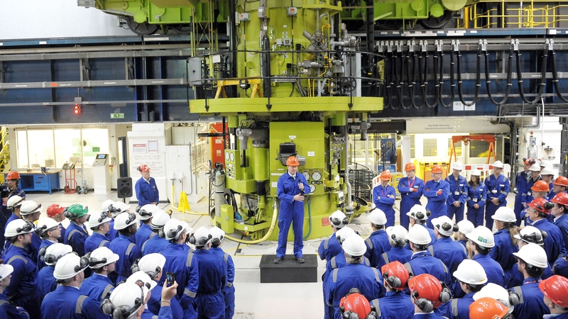 British Prime Minister David Cameron delivers a speech to workers in the Charge Hall at Hinkley Point B