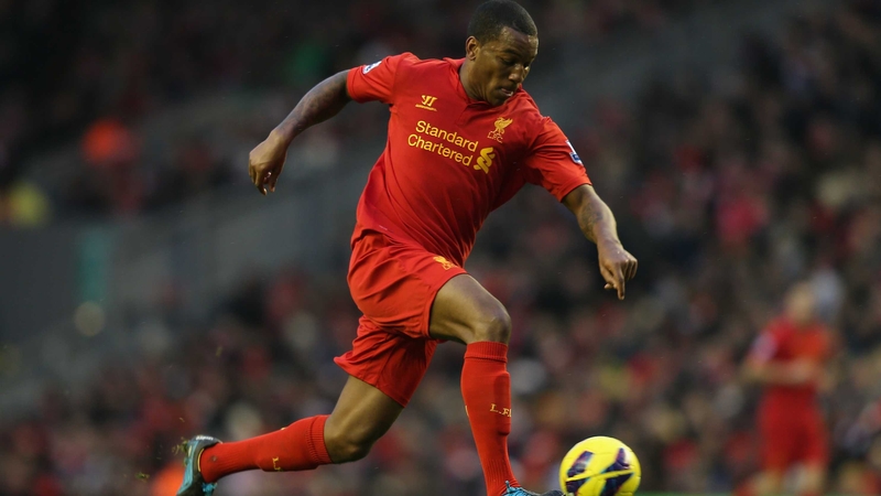 Andre Wisdom in action for Liverpool in 2013